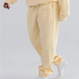 Comfrt Canary Yellow sweatpants from the Pastel Edit Collection cinched ankle L